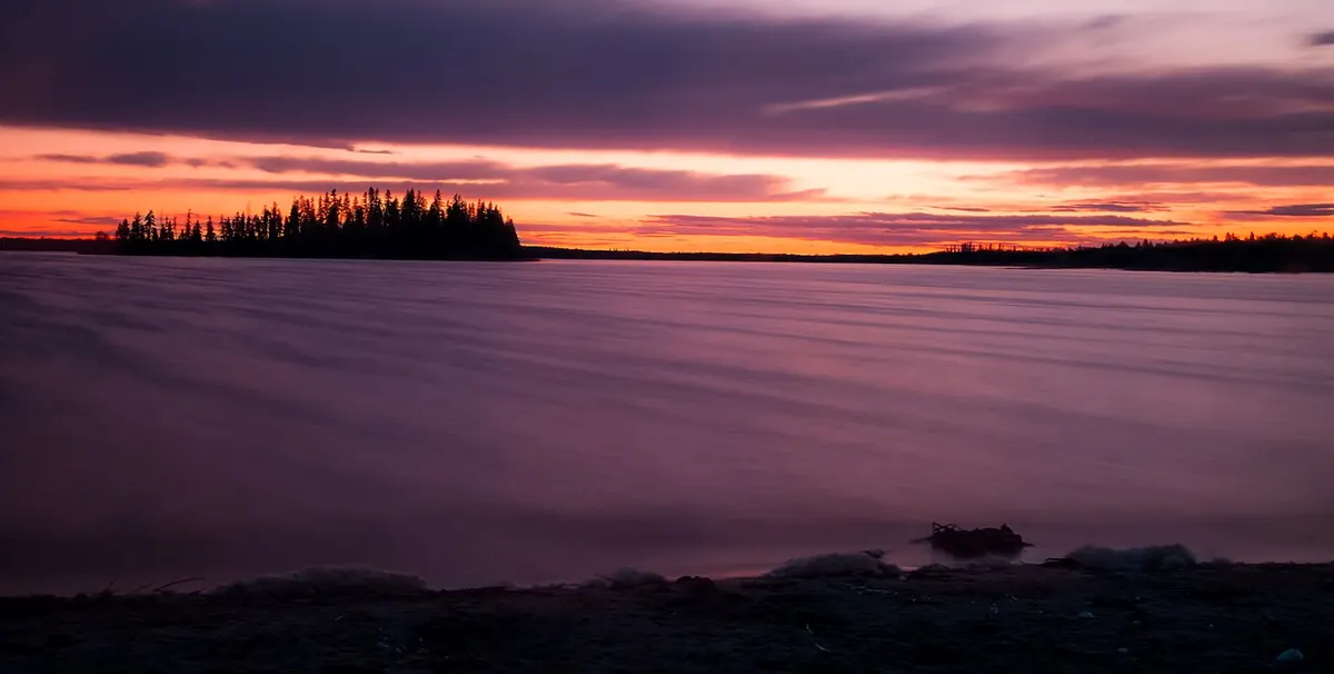 Sunset on Astotin Lake from the beach next to the campground.